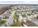 Aerial view of house and neighborhood; desirable location, tree-lined streets at 7648 Three Arch Overlook, Noblesville, IN 46062