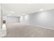 Finished basement with built-in shelving at 7648 Three Arch Overlook, Noblesville, IN 46062