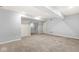 Large finished basement with multiple rooms and neutral decor at 7648 Three Arch Overlook, Noblesville, IN 46062