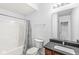 Basement bathroom with shower/tub combo and granite vanity at 7648 Three Arch Overlook, Noblesville, IN 46062