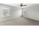 Bright bedroom with ceiling fan and carpet flooring at 7648 Three Arch Overlook, Noblesville, IN 46062
