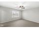 Bright bedroom with ceiling fan and carpet at 7648 Three Arch Overlook, Noblesville, IN 46062