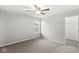 Bright bedroom with ceiling fan and carpet at 7648 Three Arch Overlook, Noblesville, IN 46062