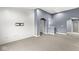 Versatile bonus room with gray walls and white shiplap feature wall at 7648 Three Arch Overlook, Noblesville, IN 46062