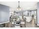 Casual dining area with round table and chairs, perfect for everyday meals at 7648 Three Arch Overlook, Noblesville, IN 46062