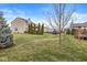 House exterior showcasing a large backyard and landscaping at 7648 Three Arch Overlook, Noblesville, IN 46062