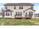 Two story house with deck and landscaped yard at 7648 Three Arch Overlook, Noblesville, IN 46062