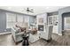 Spacious living room featuring a fireplace and built-in shelving at 7648 Three Arch Overlook, Noblesville, IN 46062