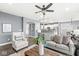 Comfortable living room with hardwood floors and an open floor plan at 7648 Three Arch Overlook, Noblesville, IN 46062