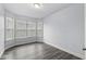 Bright office space with large bay window and wood-look flooring at 7648 Three Arch Overlook, Noblesville, IN 46062
