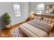 Bedroom with hardwood floors and a rustic wooden bed frame at 9155 Melrose Ct, Indianapolis, IN 46239