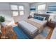 Bright bedroom with hardwood floors and large windows at 9155 Melrose Ct, Indianapolis, IN 46239