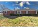 Brick ranch house with a well-maintained lawn at 9155 Melrose Ct, Indianapolis, IN 46239