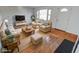 Spacious living room featuring hardwood floors and ample seating at 9155 Melrose Ct, Indianapolis, IN 46239