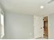 Simple bedroom with neutral gray walls and carpet at 1015 Collier St, Indianapolis, IN 46241