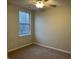 Spacious bedroom featuring neutral walls and carpet at 11224 Fall Dr, Indianapolis, IN 46229