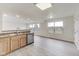 Kitchen features stainless steel appliances and light wood cabinets at 1171 Thornwood Dr, Greenwood, IN 46143