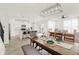 Open concept dining room with a view of a modern kitchen at 15449 Staffordshire Way, Fishers, IN 46037