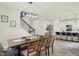 Open concept dining room with kitchen and staircase visible at 15449 Staffordshire Way, Fishers, IN 46037