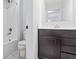 Clean bathroom with dark vanity and shower/tub at 16222 Browning Ct, Fishers, IN 46037