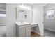 Modern bathroom with vanity and built-in storage at 16222 Browning Ct, Fishers, IN 46037