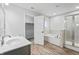Elegant bathroom featuring a soaking tub and walk-in shower at 16222 Browning Ct, Fishers, IN 46037