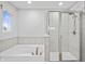 Bathroom with a bathtub and shower combo at 16222 Browning Ct, Fishers, IN 46037
