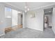 Bright dining room with gray walls, gray carpet, and access to other rooms at 16222 Browning Ct, Fishers, IN 46037