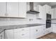 Modern kitchen with white cabinets and stainless steel appliances at 16222 Browning Ct, Fishers, IN 46037
