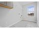 Laundry room with tile floor and ample shelving at 16222 Browning Ct, Fishers, IN 46037