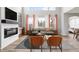 Spacious living room with fireplace and large windows at 16222 Browning Ct, Fishers, IN 46037
