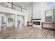 Two-story living room with hardwood floors and fireplace at 16222 Browning Ct, Fishers, IN 46037