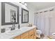 Bathroom with double vanity and large mirrors at 1705 Blue Grass Pkwy, Greenwood, IN 46143