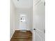 Bright entryway with wood-look flooring and white doors at 19689 Highclere Ln, Westfield, IN 46069