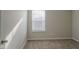 Well-lit bedroom with carpet and window blinds at 4845 Ventura Blvd, Plainfield, IN 46168