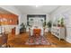 Elegant dining room with hardwood floors and a round table at 533 N Parker Ave, Indianapolis, IN 46201