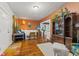 Living room with hardwood floors, a fireplace, and an open floor plan at 533 N Parker Ave, Indianapolis, IN 46201