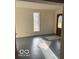 Bright entryway with grey flooring and natural light at 5967 S Lick Creek Rd, Morgantown, IN 46160
