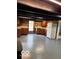 Small kitchen with wood cabinets and white appliances at 5967 S Lick Creek Rd, Morgantown, IN 46160