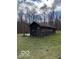 Older, rustic outbuilding on the property at 5967 S Lick Creek Rd, Morgantown, IN 46160