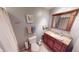 Updated bathroom with granite vanity and tiled floor at 6031 S Eaton Ave, Indianapolis, IN 46259