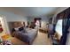 Modern bedroom with a large bed and ample storage at 6031 S Eaton Ave, Indianapolis, IN 46259