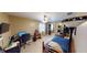 Comfortable bedroom with a bed, workspace, and large closet at 6031 S Eaton Ave, Indianapolis, IN 46259