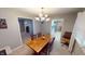 Bright dining room with a wood table and chandelier at 6031 S Eaton Ave, Indianapolis, IN 46259