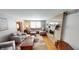 Spacious living room featuring a cozy fireplace and ample natural light at 6031 S Eaton Ave, Indianapolis, IN 46259