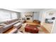 Bright living room with a comfortable sectional sofa and hardwood floors at 6031 S Eaton Ave, Indianapolis, IN 46259