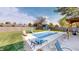 Inviting backyard oasis with a sparkling pool and patio at 6031 S Eaton Ave, Indianapolis, IN 46259