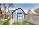 Large storage shed with double doors in backyard at 6031 S Eaton Ave, Indianapolis, IN 46259