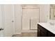 Clean bathroom, featuring a shower and double vanity at 6329 Basden Dr, Indianapolis, IN 46221