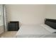 Spacious bedroom with large window and neutral walls at 6329 Basden Dr, Indianapolis, IN 46221